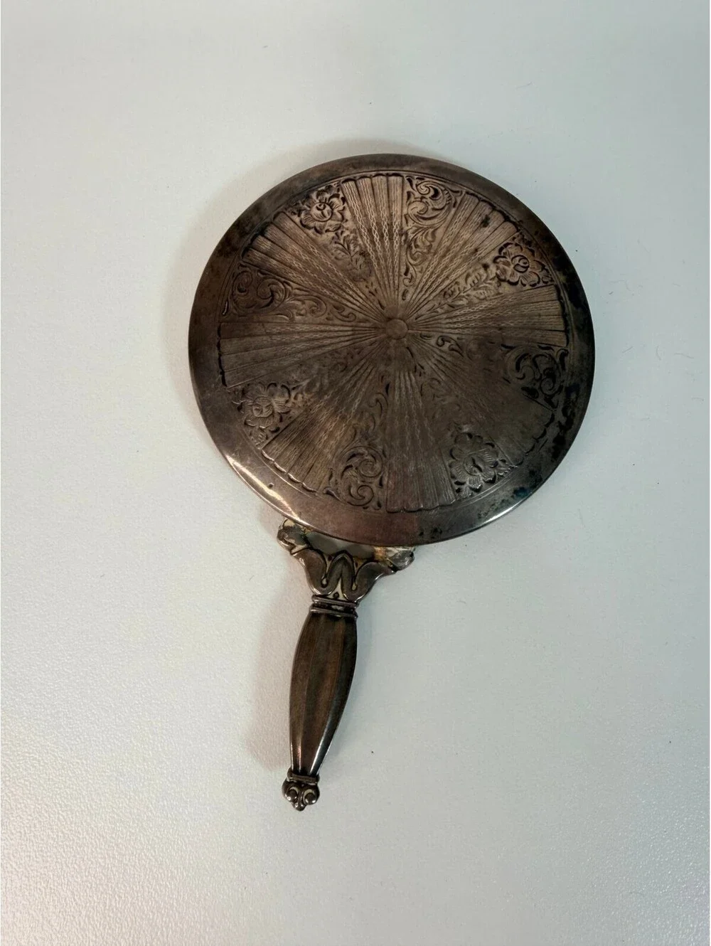 Vintage antique silver tone hand mirror with engraved sunburst back